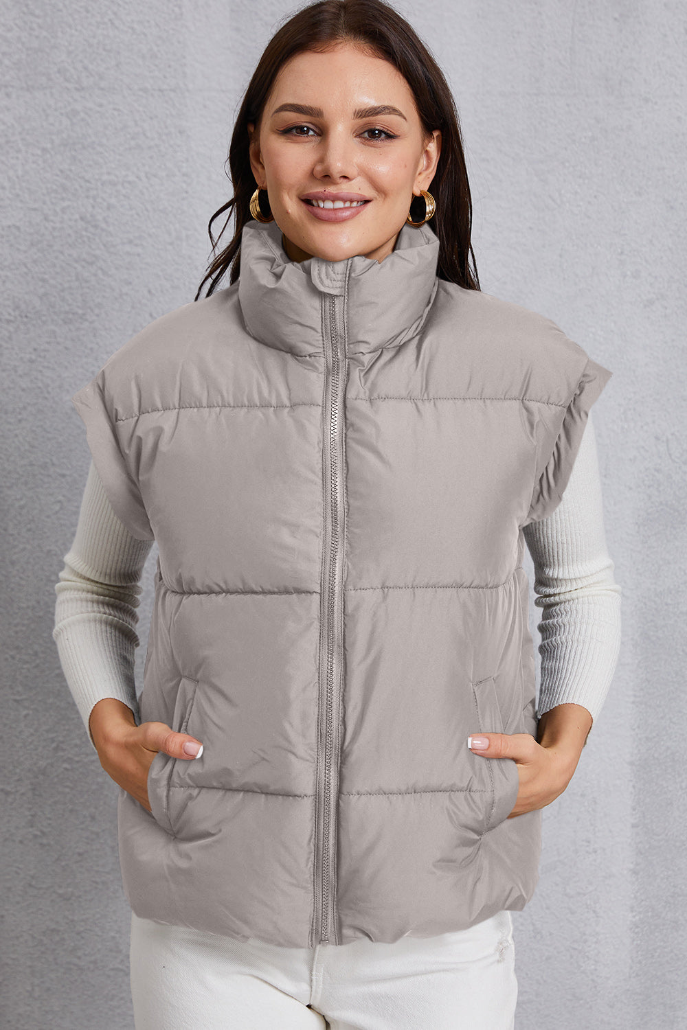 Manteau gilet avec poche et col roulé zippé