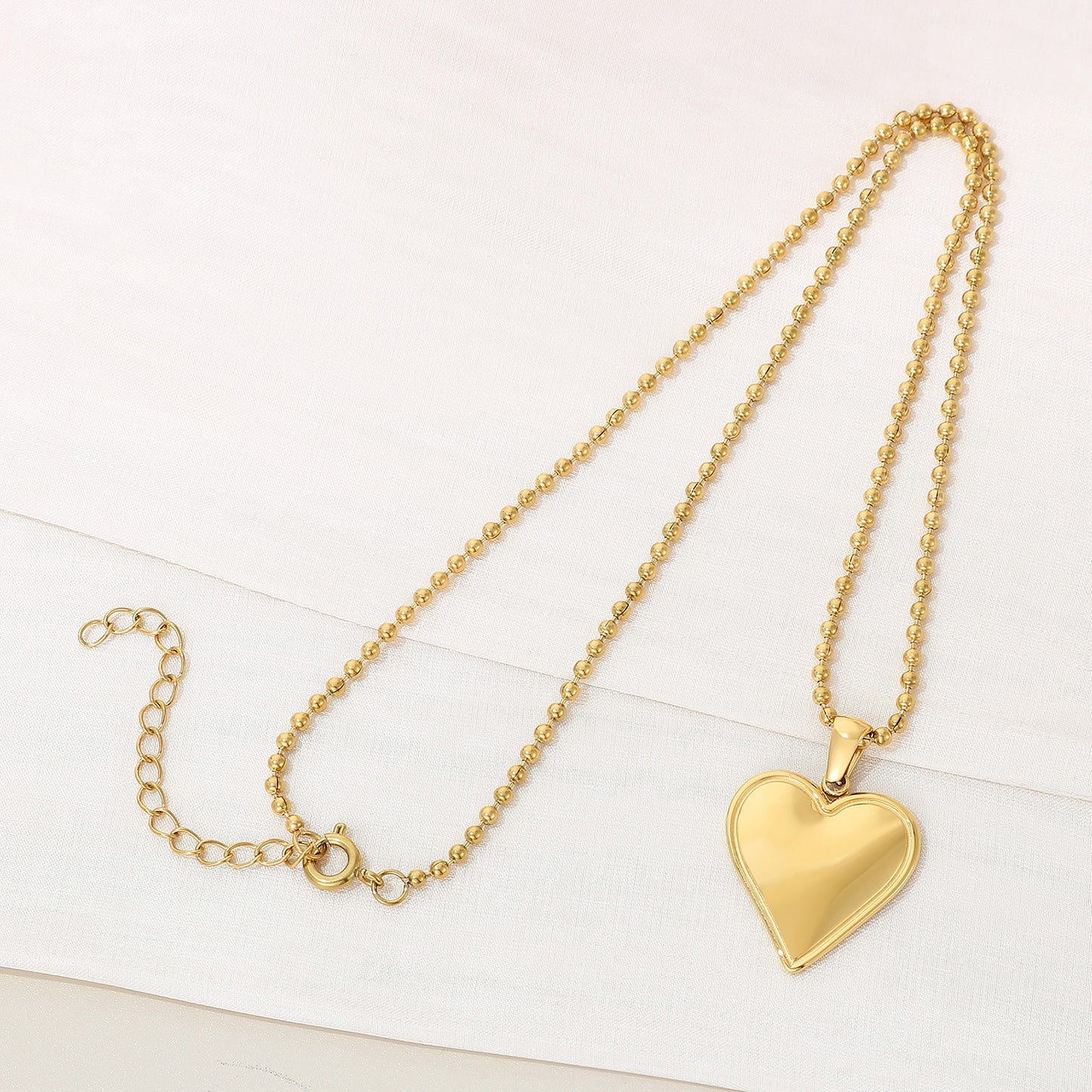 Collier pendentif coeur en acier inoxydable