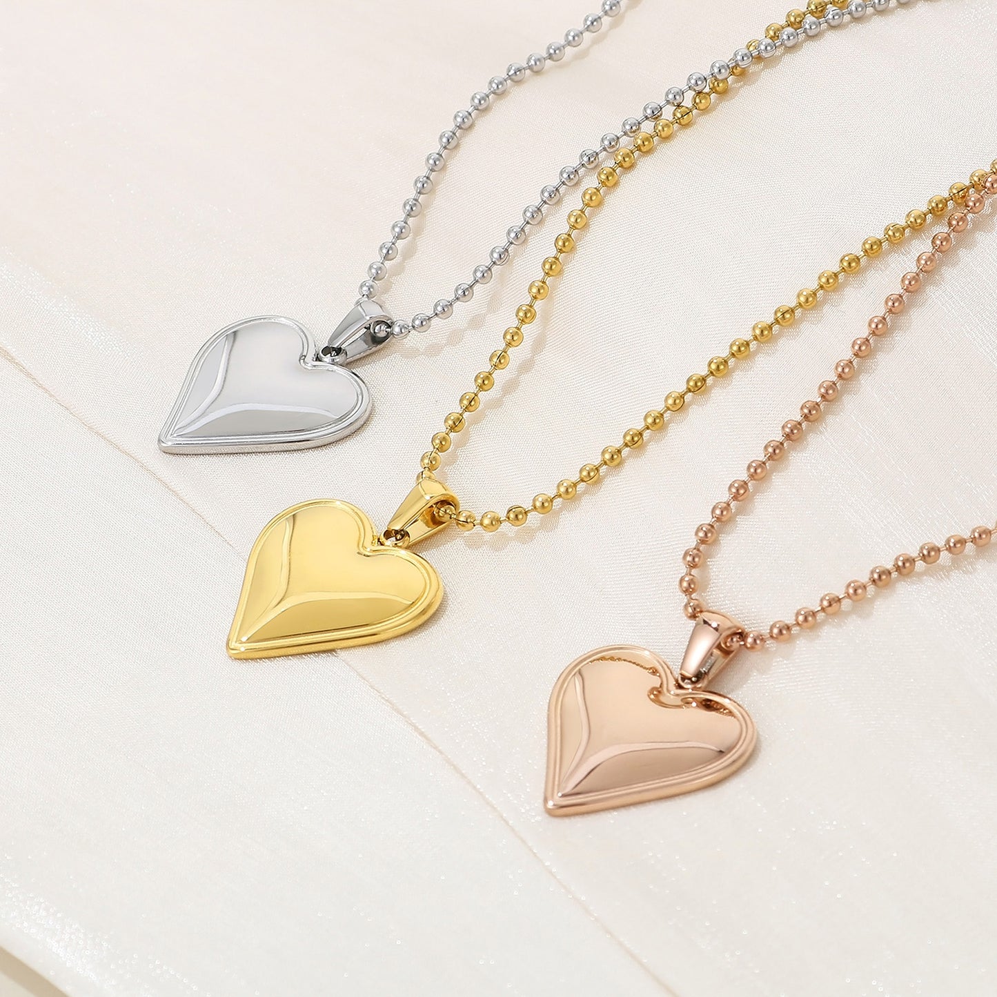 Collier pendentif coeur en acier inoxydable