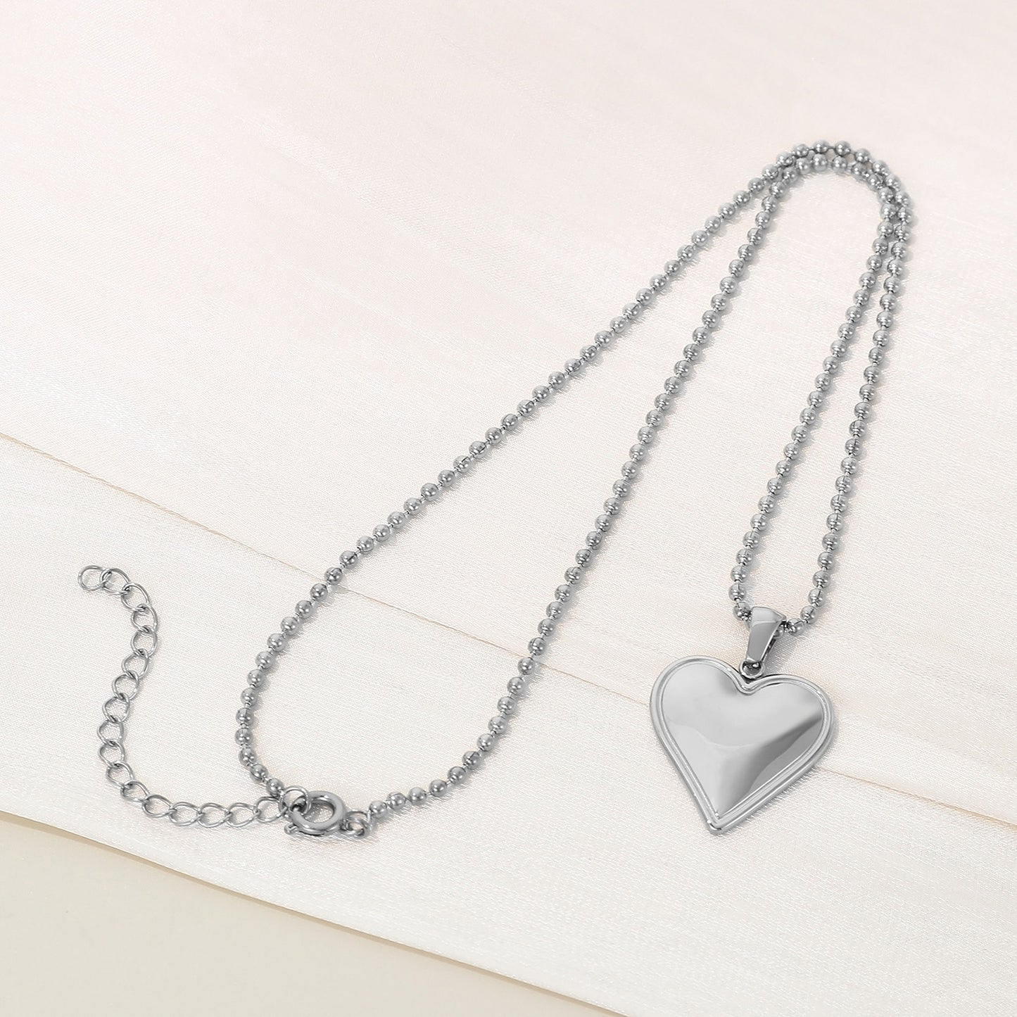 Collier pendentif coeur en acier inoxydable