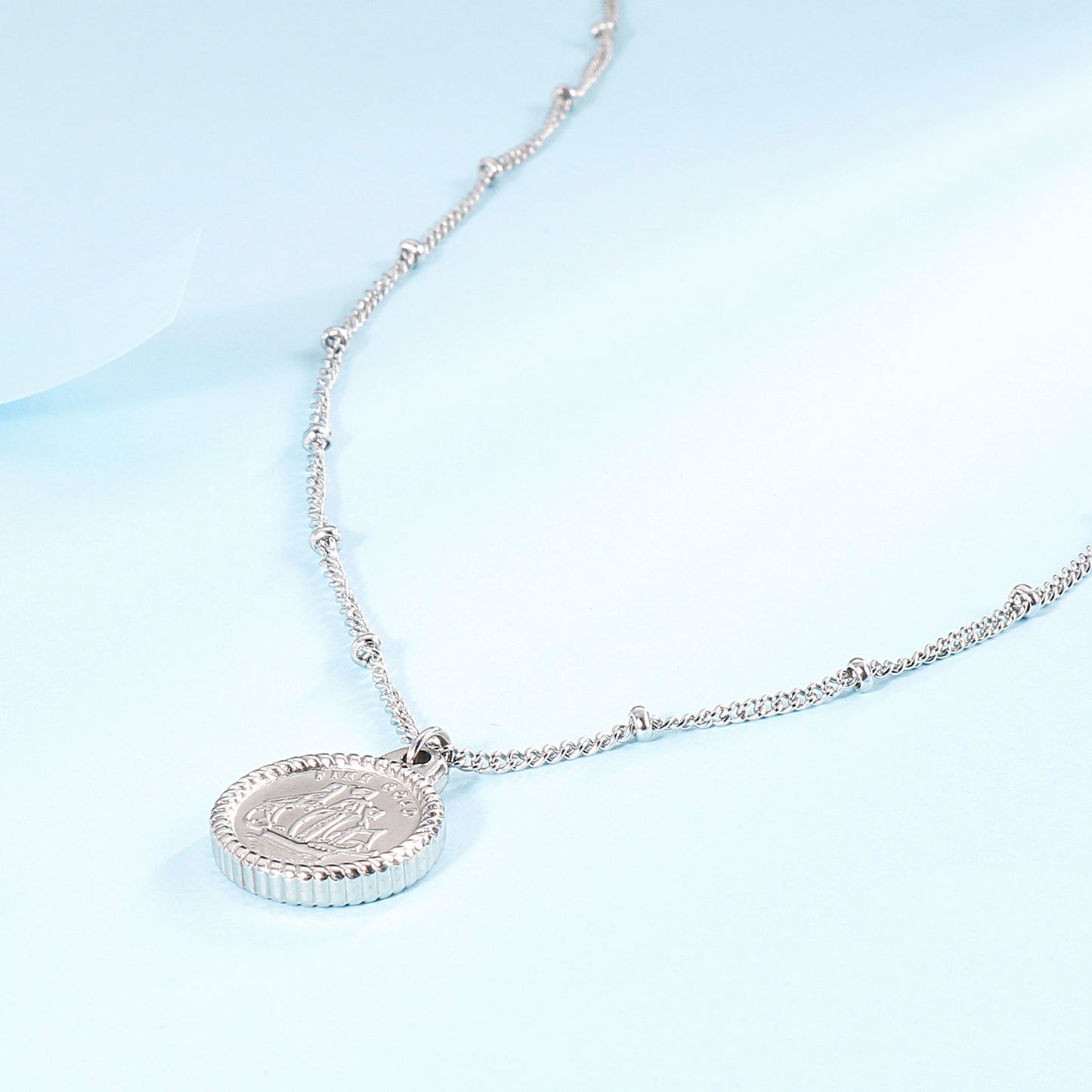 Collier pendentif pièce de monnaie en acier inoxydable