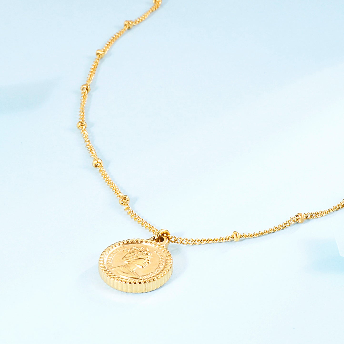 Collier pendentif pièce de monnaie en acier inoxydable