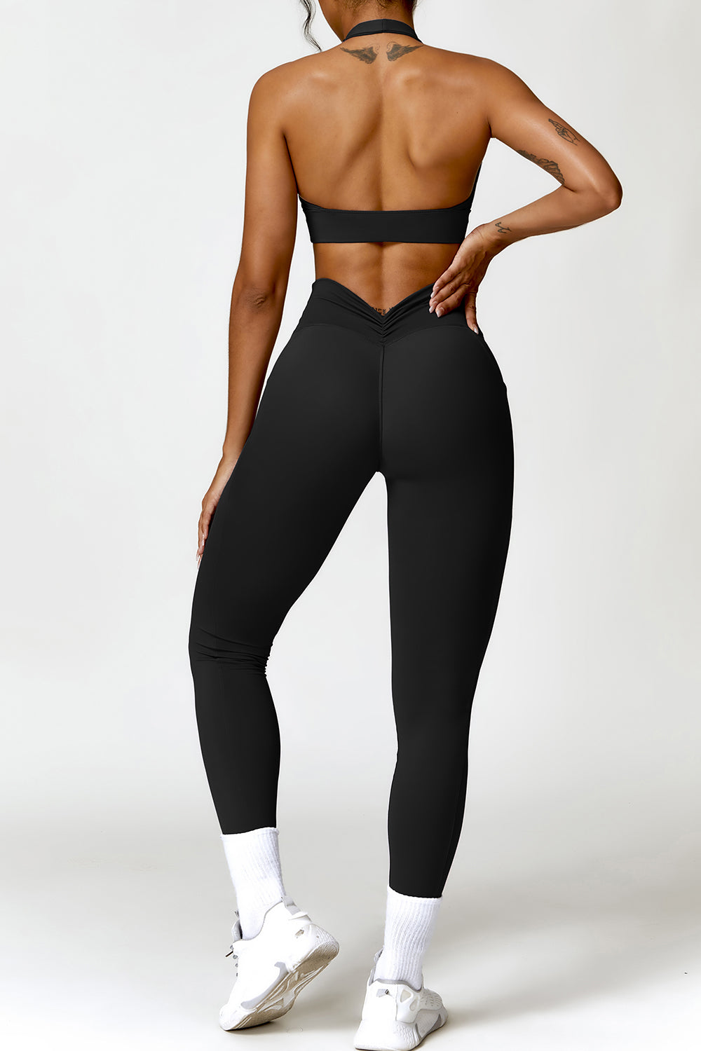 Ensemble actif soutien-gorge dos nu froncé et leggings à poches